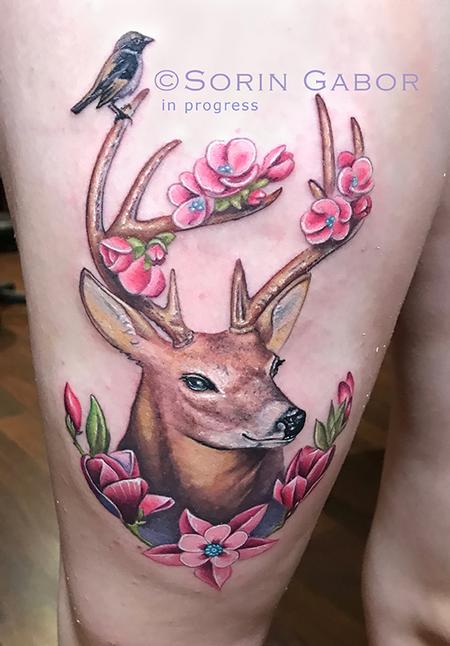 Sorin Gabor - whimsical realistic color deer tattoo with flower accents